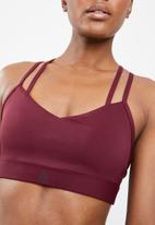 sports burgundy bra reebok strappy