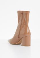 beige patent sock boots
