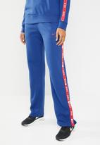 blue nike track pants