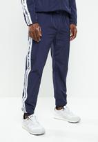 mennace tracksuit