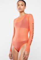 orange nike bodysuit