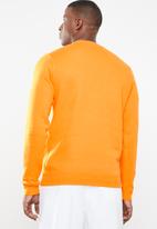 nike club crew neck sweat in dusty orange