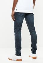 S.P.C.C. - Feather classic rinse jeans - blue