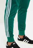 sst track pants green