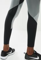 grey nike bottoms womens