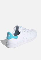 stan smith blue glow