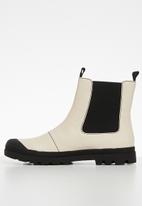 beige lug sole booties