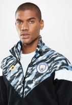 PUMA - Manchester City FC Iconic MCS Men's Track Jacket    - black & blue 