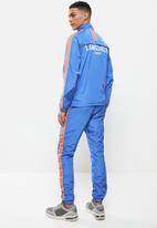 Lonsdale - Nylon strapped tracksuit - blue & orange