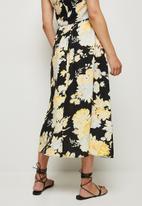 MILLA - A-line midi skirt - black & yellow 