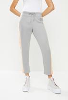 Converse - Star print tapered pant dolphin - grey & peach 
