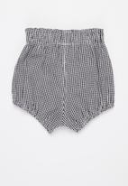 POP CANDY - Baby boys elastic waist shorts - black & white 