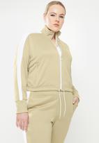 PUMA - Plus iconic t7 crop jacket - beige