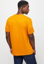 Lark & Crosse - Leo organic crew neck tee with chest embroidery - burnt orange
