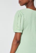 Superbalist - Textured fabric puff sleeve tee - caledon