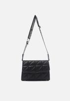 Trendyol - Triangular quilt crosdbody bag - black