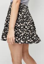 Blake - Tiered mini skirt - black floral