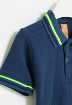 UP Baby - Piquet polo shirt with elastane - blue