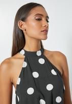 Superbalist - Hi neck cutaway shell - large polka dots