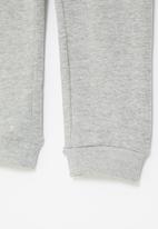 MANGO - Trousers barna - grey