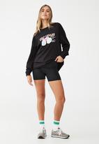 Cotton On - Slouchy graphic long sleeve top - black/keith haring city cycles