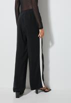 VELVET - Rayon satin palazzo with contrast side panel - black & white 
