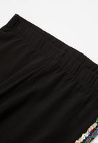 Koton Kids - Side-tape leggings - black