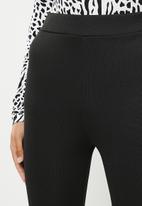 Koton - High waist flared trousers - black