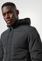 Superbalist - Shaw long puffer jacket - black