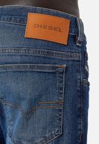 Diesel  - D-yennox tapered jeans - mid wash blue