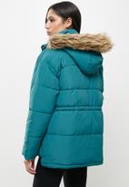 Koton - Hooded faux fur detailed puffer jacket - blue