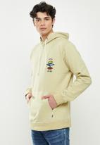 Rip Curl - Search icon hood - vintage yellow