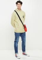 Rip Curl - Search icon hood - vintage yellow