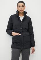 edit - Belted quilted puffer jacket - black