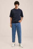 MANGO - Nestor Tapered loose cropped jeans - mid blue 