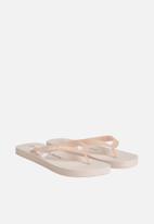 CALVIN KLEIN - Beach sandal monogram tpu - pale conch shell