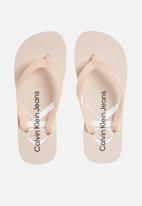 CALVIN KLEIN - Beach sandal monogram tpu - pale conch shell