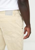 MANGO - Arena loose carpenter jeans- light beige