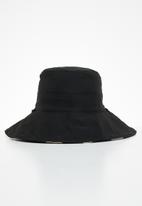 Superbalist - Reversible polka dot bucket hat - black & neutral