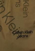 CALVIN KLEIN - Logo aop woven short - logo aop burnt olive