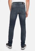 CALVIN KLEIN - Skinny jeans - denim dark