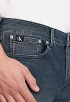 CALVIN KLEIN - Skinny jeans - denim dark