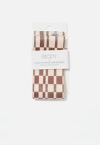 Cotton On - Single elastic resistance band - irregular checkerboard parchment