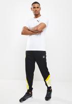 PUMA - BVB Iconic MCS Mesh Men's Football Pants -  black-cyber yellow