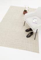 Hertex Fabrics - Overlap woven outdoor rug - deep dune