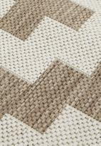 Hertex Fabrics - Jenga woven outdoor rug- tan lines