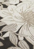 Hertex Fabrics - Blossom woven outdoor rug - after dark
