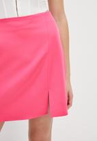 Blake - Aline mini skirt with slit - cerise