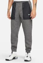 Nike - Therma-FIT  Tapered Fitness - charcoal heathr & black/white