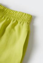 MANGO - Shorts lim - bright yellow